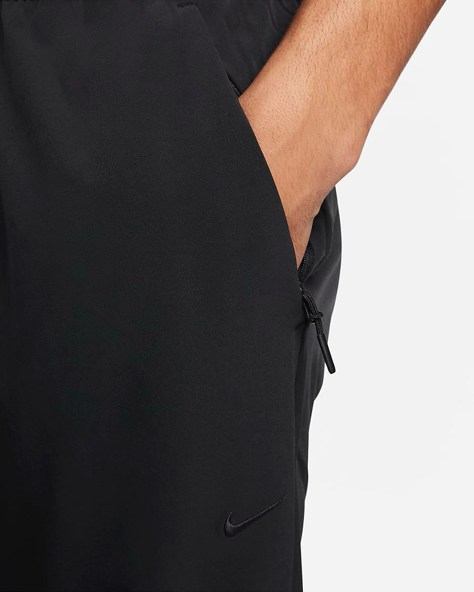 Nike Unlimited Black Dri-Fit Tapered Leg Versatile Men Pants Sz L NWT