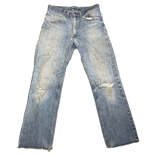 Vintage Levis orange tab men size 30 blue distressed jeans