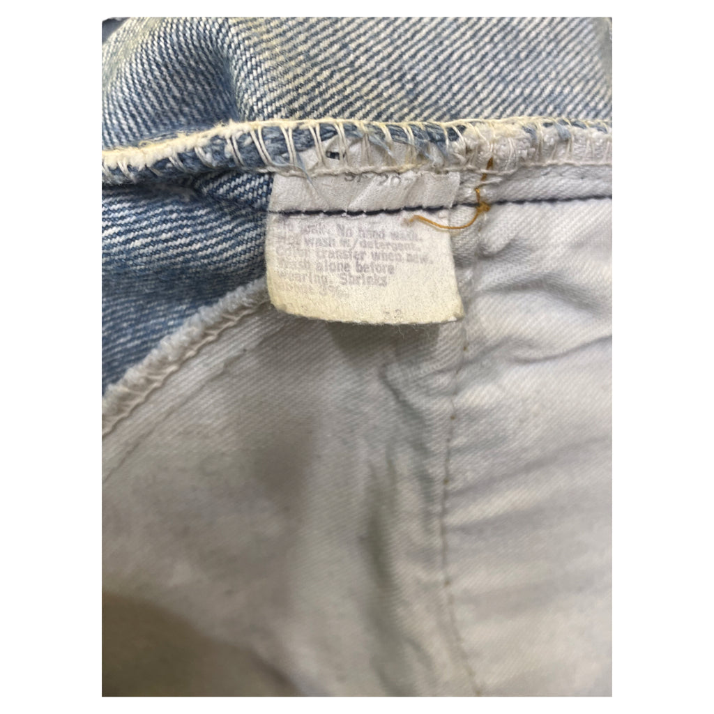 Vintage Levis orange tab men size 30 blue distressed jeans