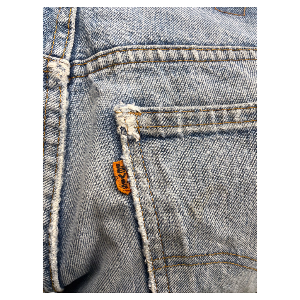 Vintage Levis orange tab men size 30 blue distressed jeans